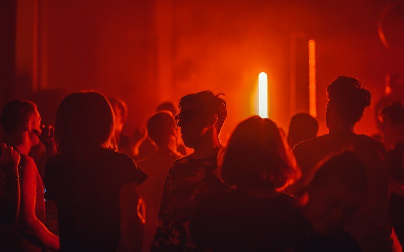 Concert crowd with dramatic lighting