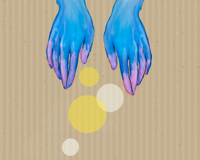 Blue and pink painted hands above yellow circles